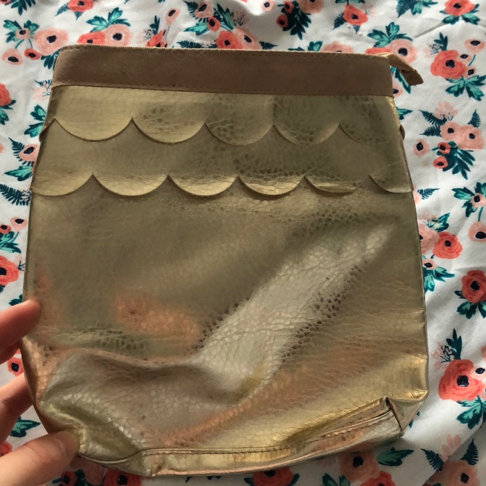 Gold makeup bag